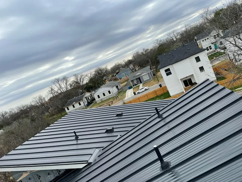 Standing seam metal roof panels with vents for Skylight Repair in Medina